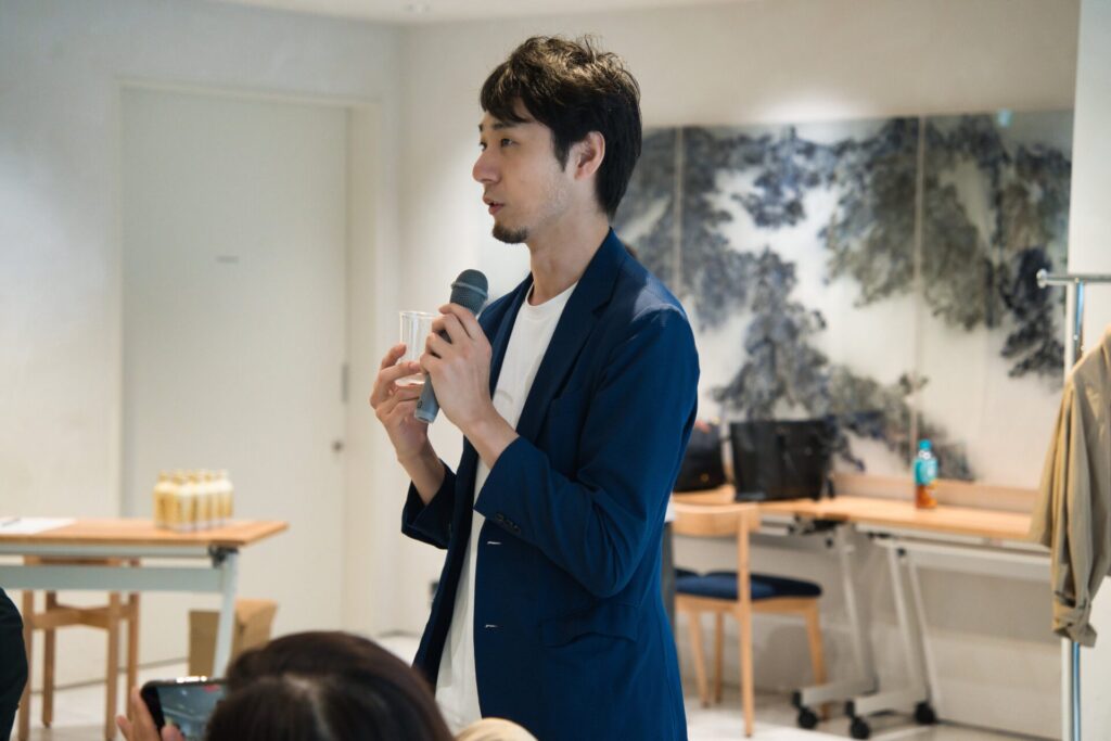 Mr. Inari Watanabe, instructor at the SSI Sake Academy, offered tasting commentary on Tsunan, the award-winning Junmai Daiginjo.